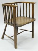 A circa 1900 stained beech stick back chair of square form,