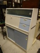 A mid 20th Century painted kitchen cabinet