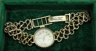 A 19 carat gold cased Rolex Tudor ladies wristwatch with open rope figure-of-eight style strap, 21.