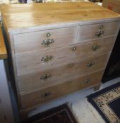 A Victorian pine chest of two short above three long drawers raised on bracket feet