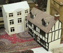 A mock Tudor dolls' house and a modern MDF Georgian style dolls' house,
