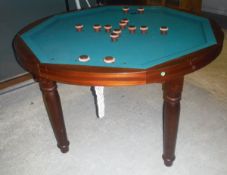 A modern mahogany framed bumper pool table with ten centre pillars and two pillars either side of