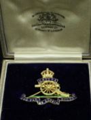 A Royal Artillery 9 carat gold and enamel decorated badge, 6.