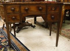 A 19th Century mahogany lowboy with plain top above five drawers,