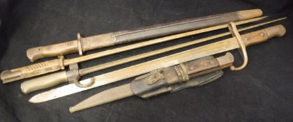 A Wilkinson 1907 model bayonet and metal-mounted leather scabbard,