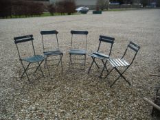 Five green painted folding garden chairs