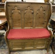A stained beech box seat hall settle in the Gothic Revival taste