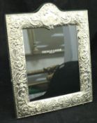 A modern embossed silver photograph frame for Thomas Goode