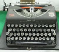 An Imperial "The Good Companion Model T" portable manual typewriter