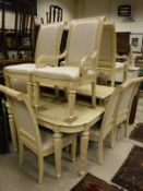 A cream American dining room suite comprising extending dining table,