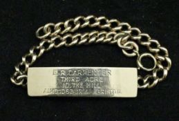 A 9 carat gold name bracelet (31 g)