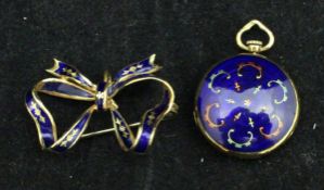 An 18 carat gold and blue enamelled bow brooch and locket, 9.
