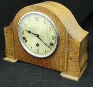 An oak cased mantle clock and an Art Deco style oak cased barometer thermometer