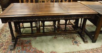 An oak draw leaf dining table in the Gothic Revival taste,