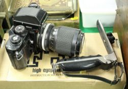 A Nikon F3 35mm camera with Nikkor lens