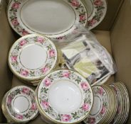 A Royal Worcester Fine Bone China "Royal Garden" wild rose decorated dinner service