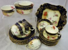 A collection of various china wares to include Franklin Mint Victoria and Albert teapot collection,