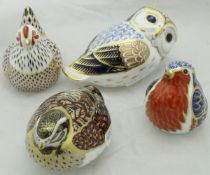 A collection of four Royal Crown Derby Japan pattern bird figures including "Owl" (gold button),