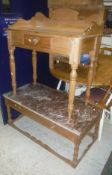 A pitch pine washstand with galleried back and single drawer on turned legs,