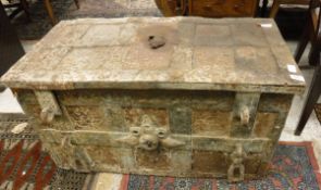 A 17th Century iron "Armada" chest of typical form with lattice work studded decoration,