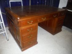An Edwardian mahogany partner's desk,