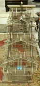 A bamboo bird cage of four tier pagoda form