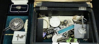 A jewellery box containing various costume jewellery and trinkets including various charms,