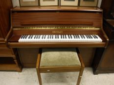 A modern sapele cased upright piano, the iron framed over strung movement by Bentley,