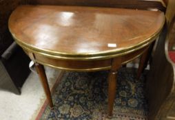 A French mahogany and brass bound card table in the Louis Philippe taste,