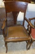 A set of three early 20th Century dining chairs with cane back and barley twist supports,