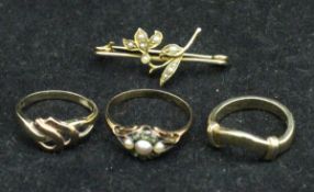 A selection of three various 9 carat gold ladies rings and a 9 carat gold and seed pearl set brooch,