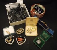 A box of assorted jewellery to include various jet chokers, necklaces, etc,