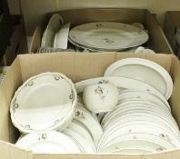 Two boxes containing a Continental part dinner service,