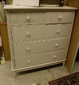 A modern John Lewis cream painted chest of two short over three long drawers