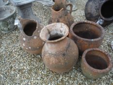 A collection of five various terracotta pots/jardiniers,