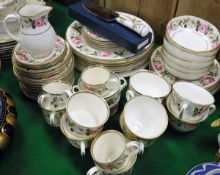 A Royal Worcester bone china "Royal Garden" pattern rose decorated dinner/tea service