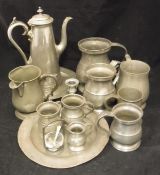 A box of various pewter wares to include various 19th Century and other mugs and measures (9),