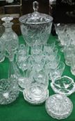 A cut glass floral decorated punch bowl and twelve glasses, together with various small dishes,