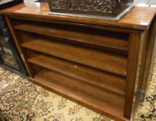 A late Victorian mahogany open bookcase with adjustable shelving on a plinth base