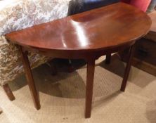 A mahogany demi-lune side table (dining table end section) on square chamfered supports