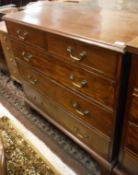 A 19th Century mahogany square front chest of two short over three long graduated drawers,