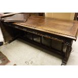 An oak draw leaf dining table in the Gothic Revival taste,