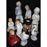 A Lladro figure "A Sailor Boy", Nao figure "Girl holding candle", two Lladro figures of geese,