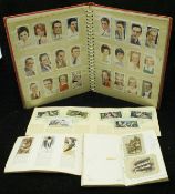 An album of cigarette cards including regimental symbols, famous sportsmen, bicycles, film stars,