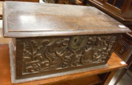 A carved oak box in the 17th Century Welsh manner,