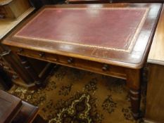 A Victorian stained pine and mahogany writing table,