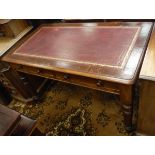 A Victorian stained pine and mahogany writing table,