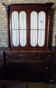 A Victorian mahogany secretaire bookcase cabinet with glazed two door upper section over a fitted