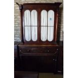 A Victorian mahogany secretaire bookcase cabinet with glazed two door upper section over a fitted