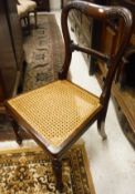 A set of six Victorian rosewood kidney back dining chairs on turned and carved front legs